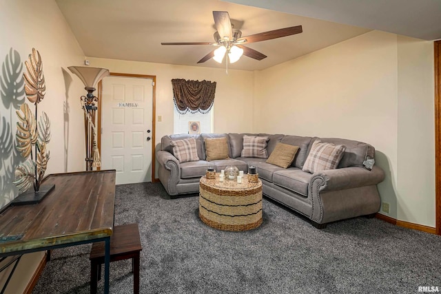 carpeted living room with ceiling fan