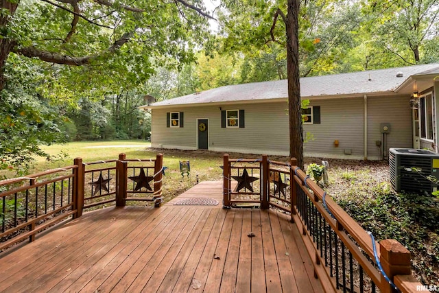 wooden terrace featuring central air condition unit