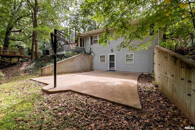 back of property with a patio