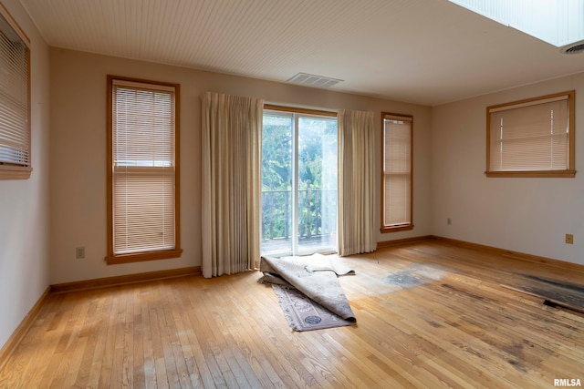 empty room featuring light hardwood / wood-style floors