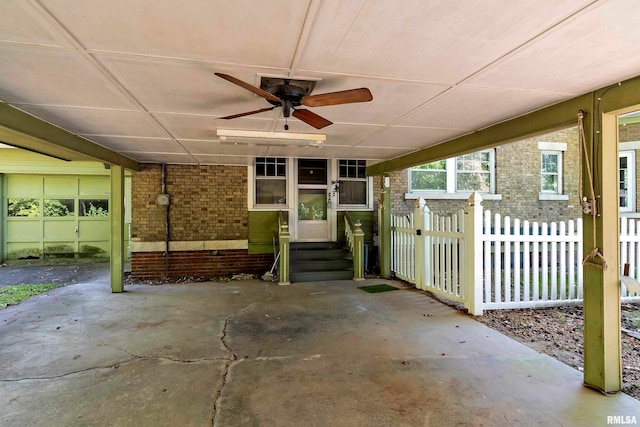 view of patio featuring ceiling fan