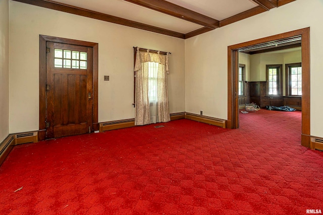 carpeted entryway with crown molding, beam ceiling, and a baseboard heating unit