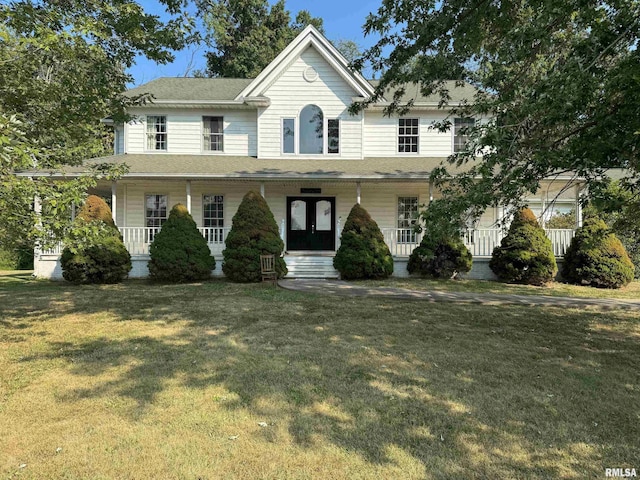 view of front of home featuring a front yard