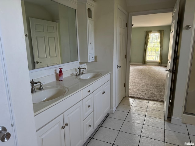 bathroom with vanity and tile patterned floors