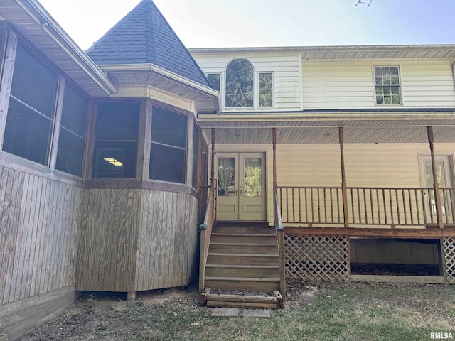 back of house featuring french doors