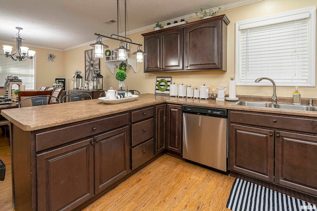 kitchen featuring dishwasher, crown molding, sink, light hardwood / wood-style flooring, and decorative light fixtures