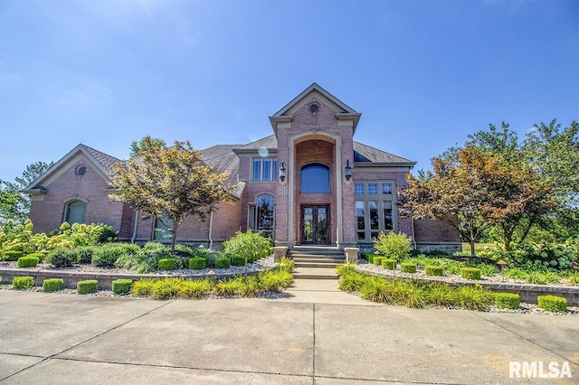 view of front of property with brick siding