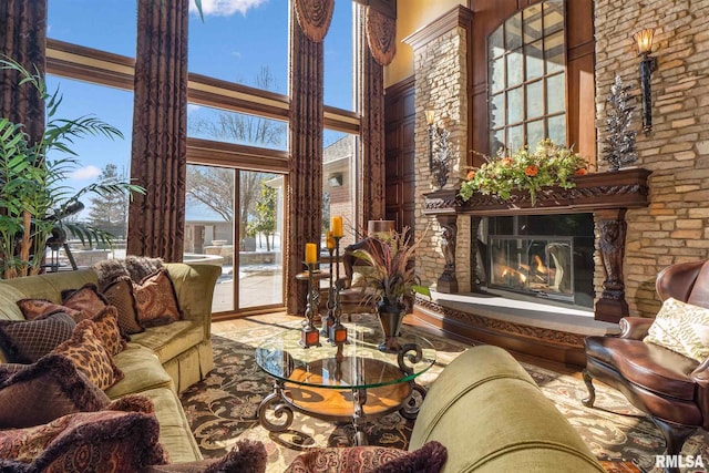 living room featuring a high ceiling