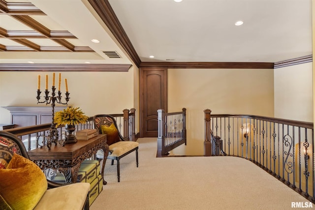 sitting room featuring crown molding, coffered ceiling, beam ceiling, and light colored carpet