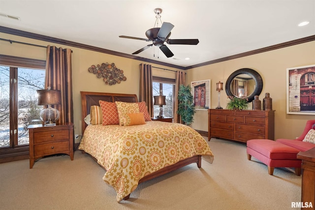 bedroom featuring multiple windows, carpet, ornamental molding, and ceiling fan