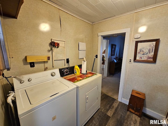 laundry area featuring dark hardwood / wood-style floors and washing machine and dryer