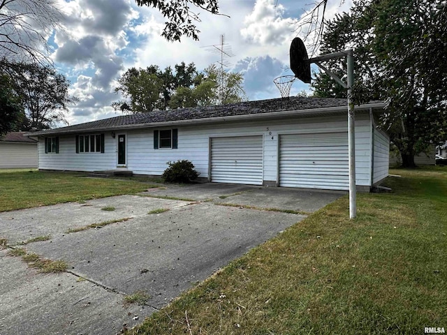 exterior space featuring a front yard and a garage