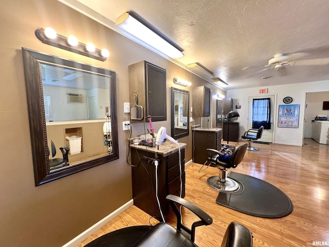 1106 N 11th St, Murphysboro, IL 62966 - interior space featuring light wood finished floors, baseboards, ceiling fan, and a textured ceiling