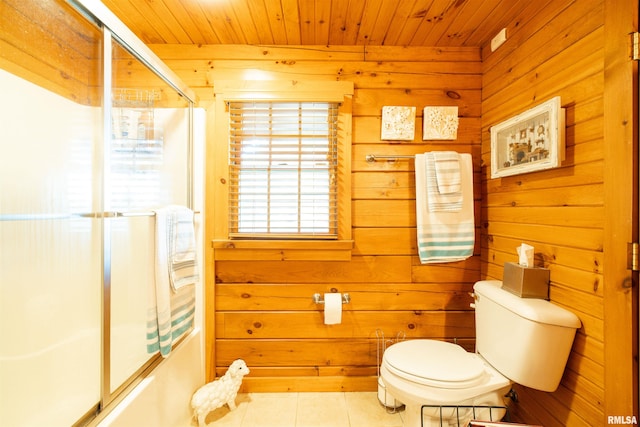 full bath featuring tile patterned floors, toilet, wood ceiling, and wood walls