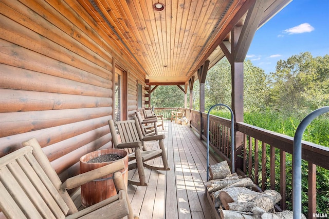 wooden terrace with covered porch