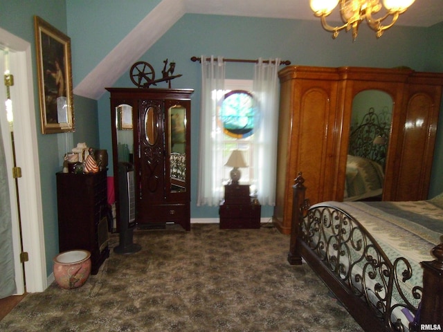 bedroom featuring vaulted ceiling and an inviting chandelier
