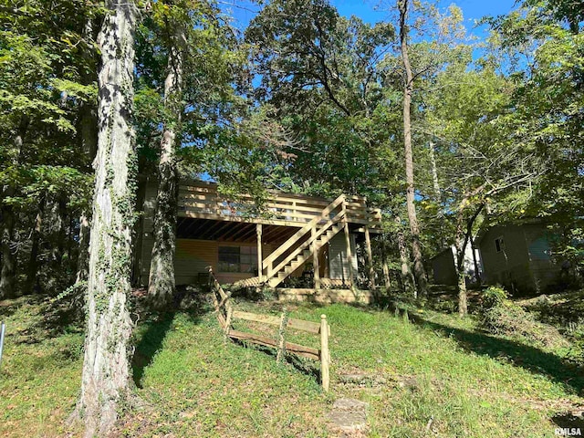 view of yard with a wooden deck