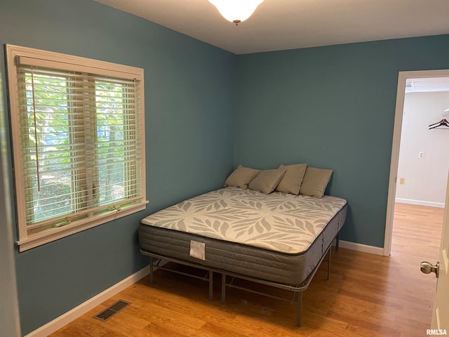 bedroom featuring light hardwood / wood-style flooring