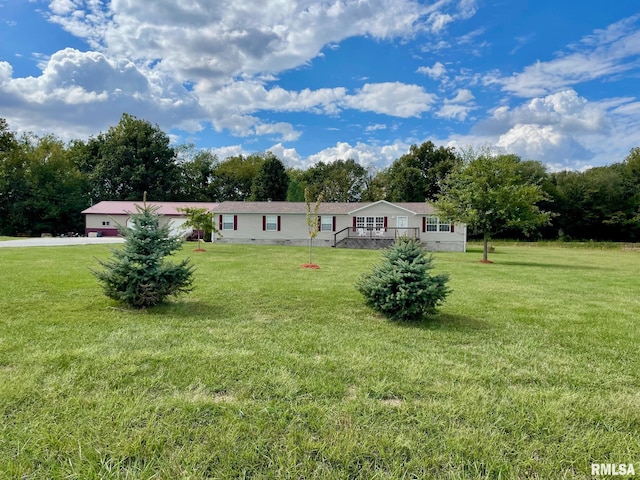 view of front of property with a front yard and a porch