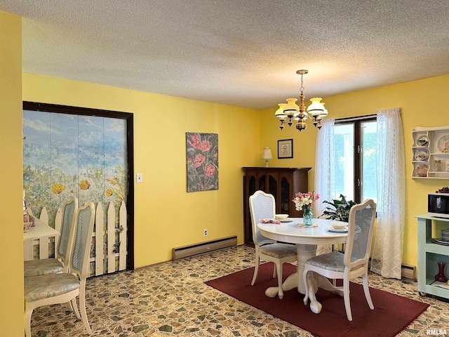 dining space with a textured ceiling, a chandelier, and a baseboard radiator