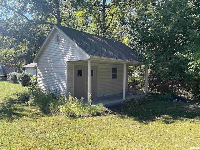 garage featuring a yard