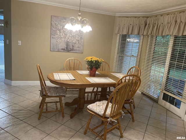 dining room featuring a chandelier, light tile patterned flooring, baseboards, and ornamental molding