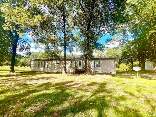 view of yard featuring a wooden deck