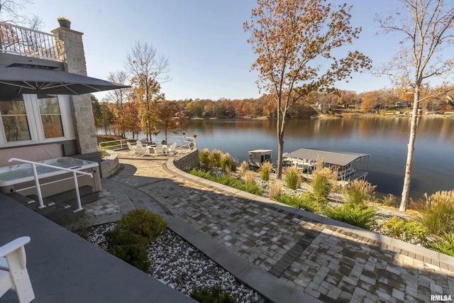 exterior space with a water view