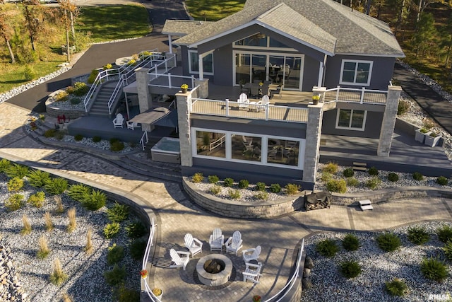 rear view of property with a patio area