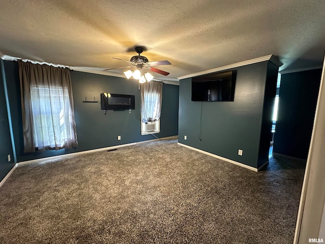 carpeted empty room with a textured ceiling, cooling unit, ornamental molding, and ceiling fan