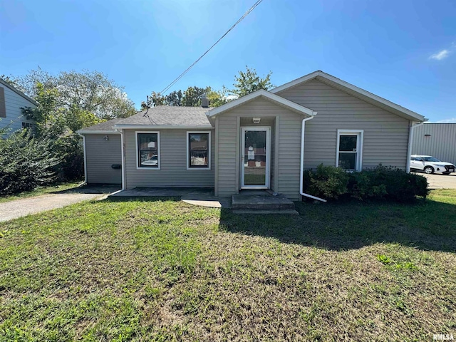 view of front of house with a front lawn