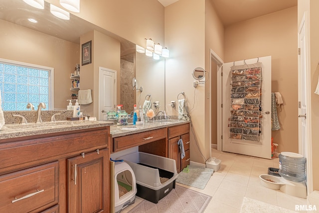 bathroom with vanity and tile patterned floors