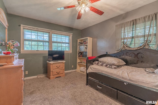 bedroom featuring ceiling fan and light colored carpet