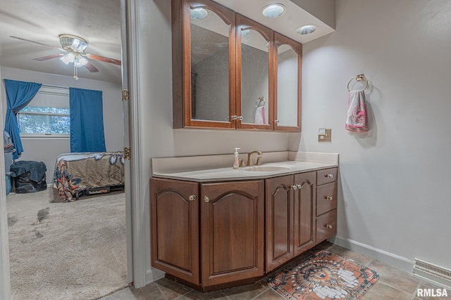 bathroom featuring vanity and ceiling fan