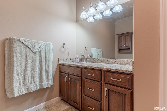 bathroom featuring vanity and tile patterned flooring