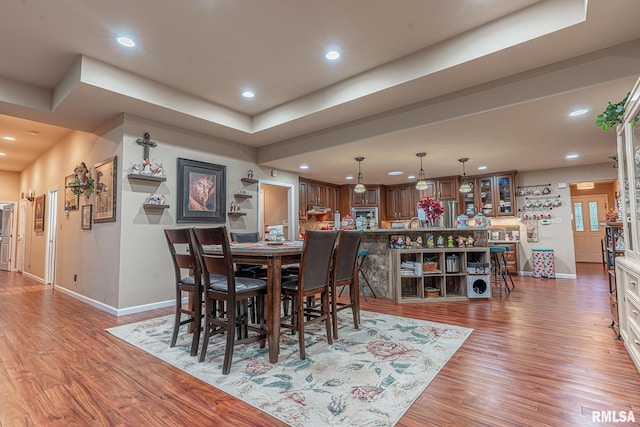 dining space featuring hardwood / wood-style floors