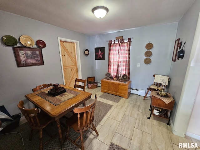 dining area with baseboard heating