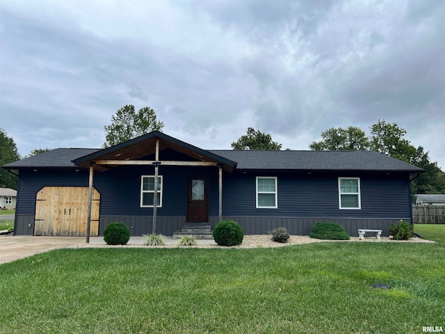 single story home with a front yard