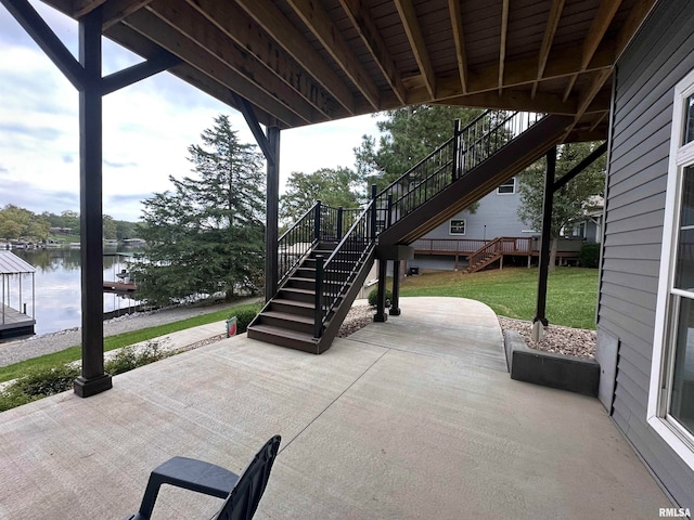 view of patio / terrace featuring a water view