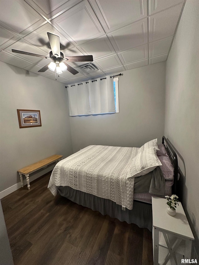 bedroom featuring hardwood / wood-style floors and ceiling fan