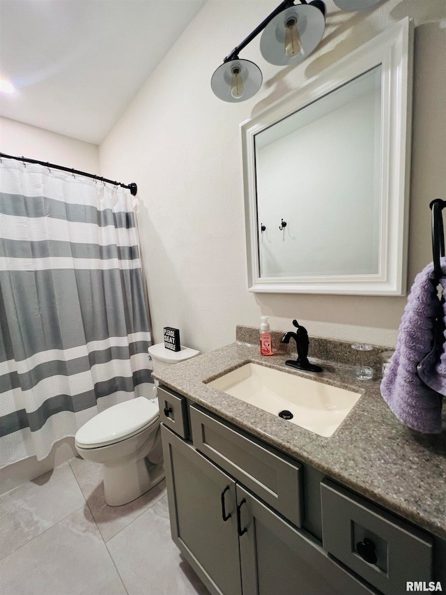 bathroom with vanity, toilet, and a shower with shower curtain