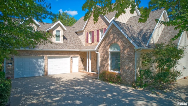 1803 N Dawn Dr, Marion, IL 62959 - view of front of property featuring driveway, a shingled roof, a garage, and brick siding