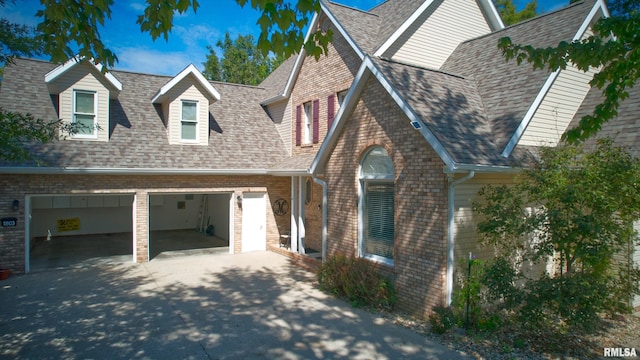 view of front of property with a garage