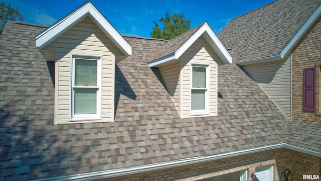 1803 N Dawn Dr, Marion, IL 62959 - view of side of home with brick siding and roof with shingles