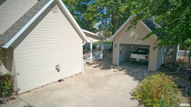 1803 N Dawn Dr, Marion, IL 62959 - view of side of property featuring an outdoor structure and roof with shingles