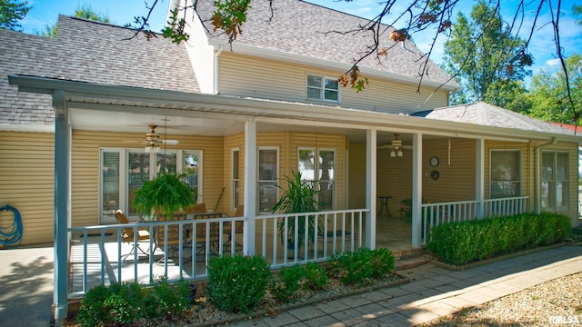 exterior space with ceiling fan and a porch