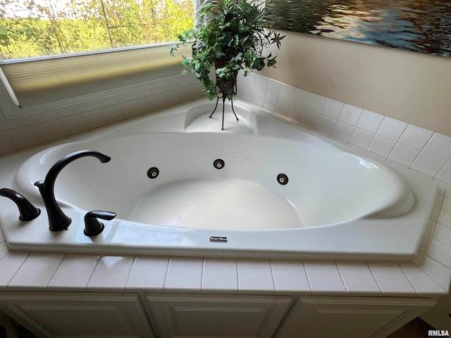 bathroom with a tub