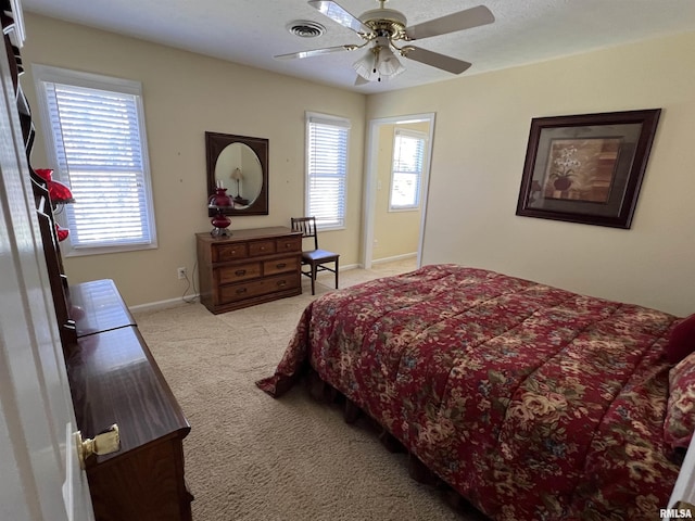 1803 N Dawn Dr, Marion, IL 62959 - bedroom featuring baseboards, multiple windows, light colored carpet, and visible vents