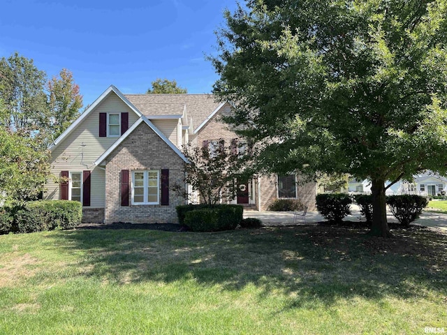 1803 N Dawn Dr, Marion, IL 62959 - view of front of home with brick siding and a front lawn