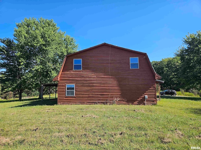 view of property exterior with a yard